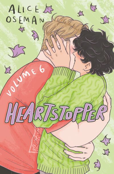 A boy with brown curly hair embraces and kisses a boy with blonde hair. Heartstopper Volume 6 by Alice Oseman.